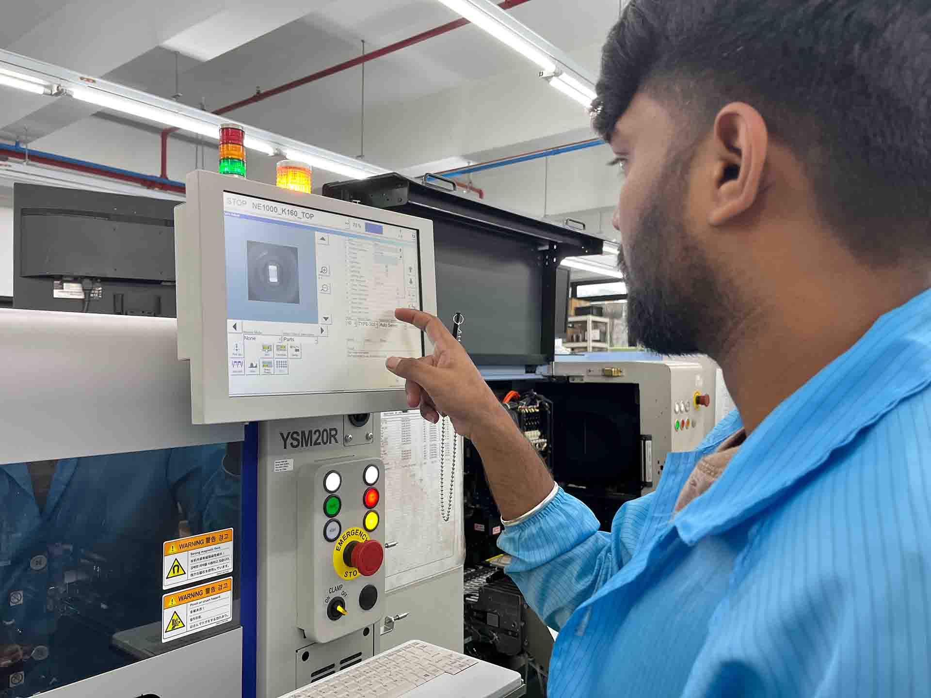 A Statron employee as he operates one of their special equipments